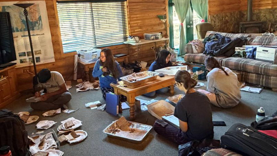After mornings at the dig site, Beach students work together to catalog newly-unearthed finds.