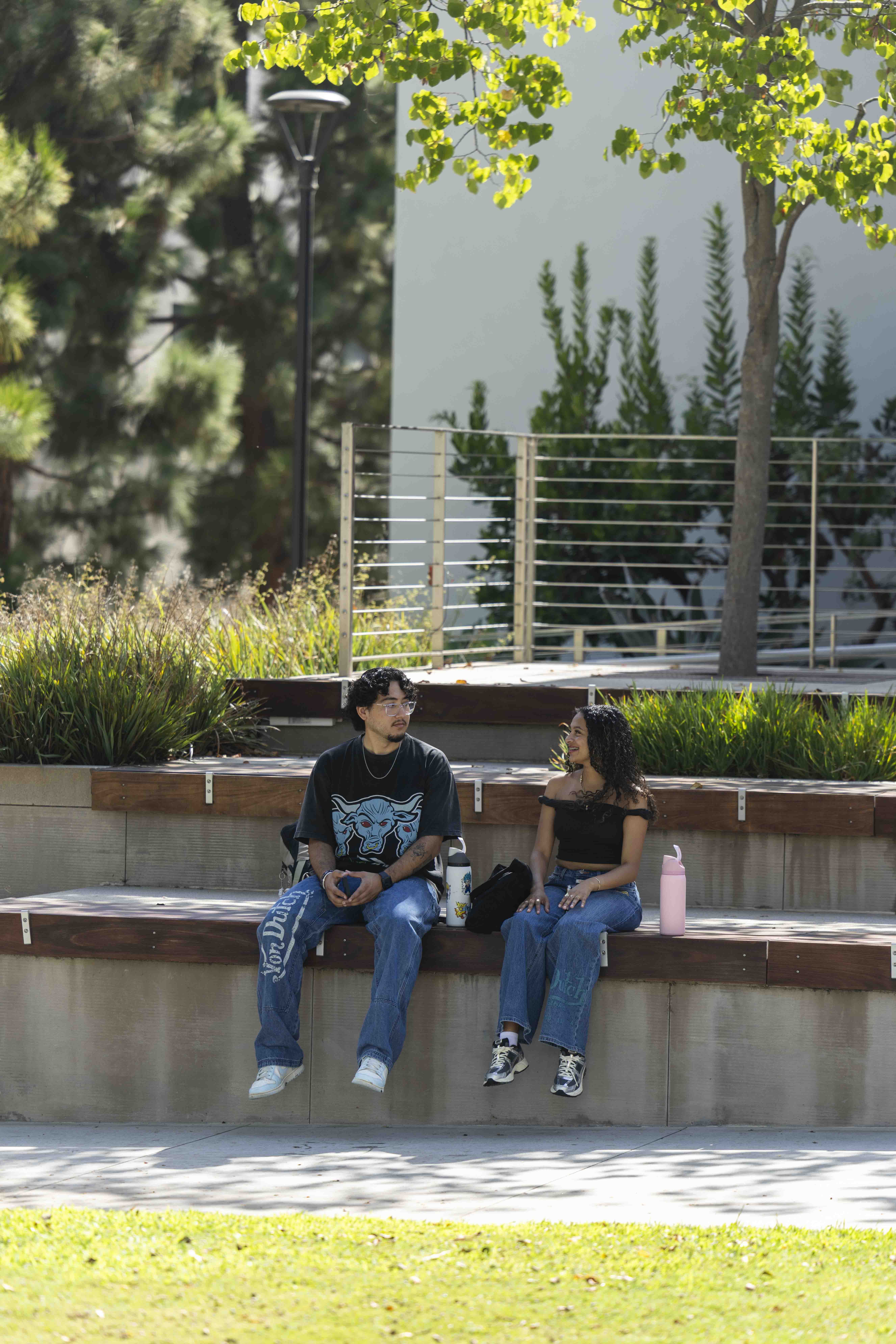Two students sitting and talking