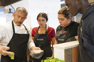 Students learning how to make tortillas.