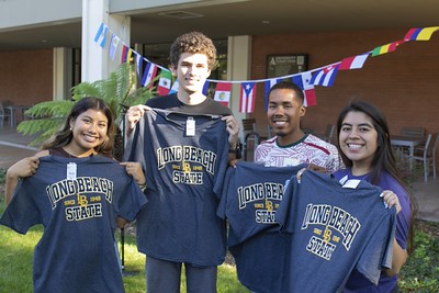 Students posing with their LB t-shirts.