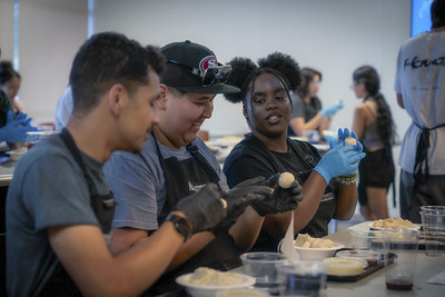 Students making pupusas.