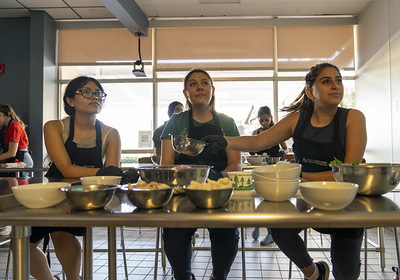 Students learning how to make pupusas.