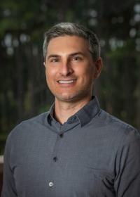man in grey shirt