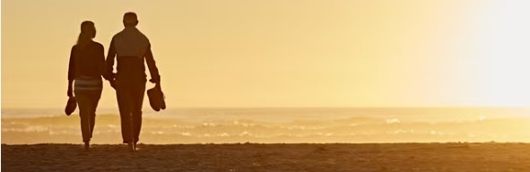 Couple walking on beach