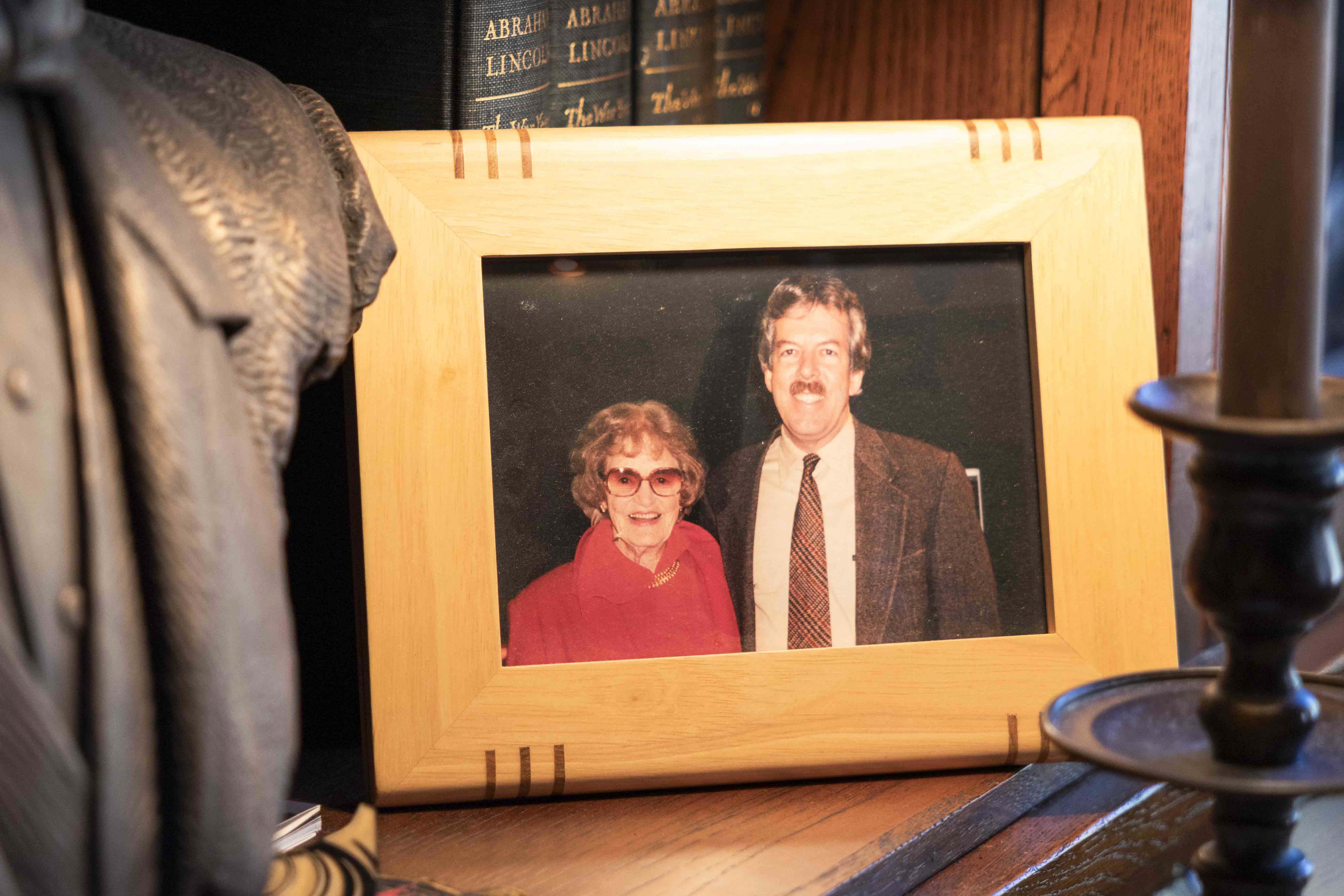 Two people in a framed photograph
