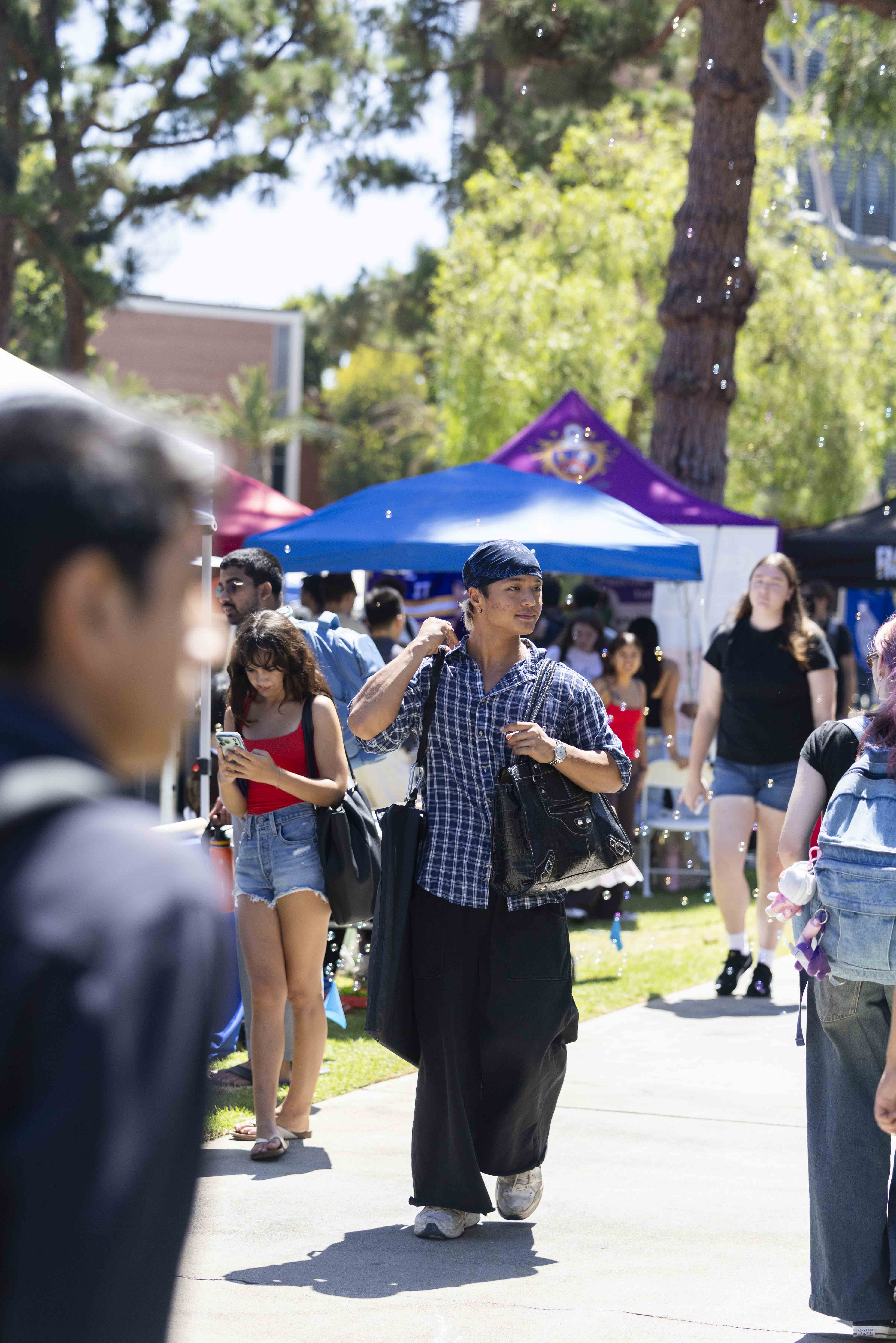 Student walking around Week of Welcome 2026