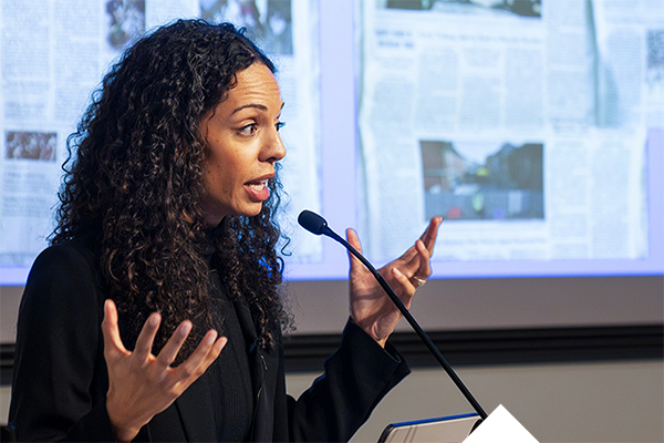 Caitlin Dickerson presenting
