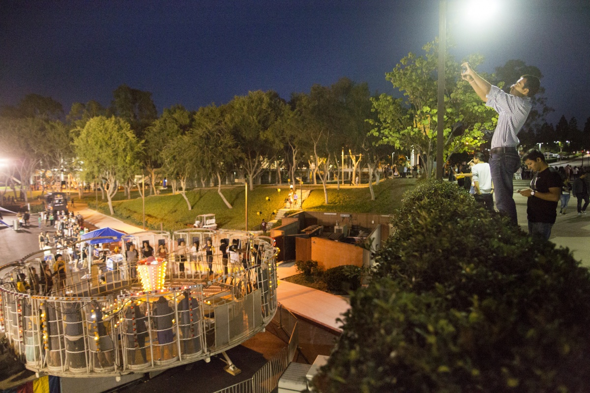 an aerial view of a carnival ride full of students