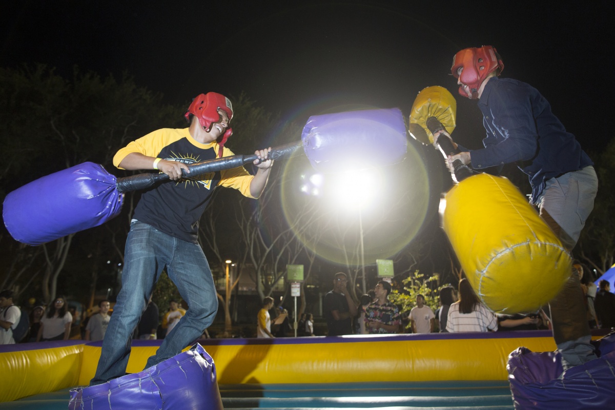 students fight with foam mallets 