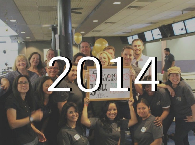 4.jpg Group of bowlers holding a sign for 2014 bowling for books