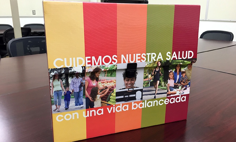 Tool kit design with pictures of latinos doing healthy activ