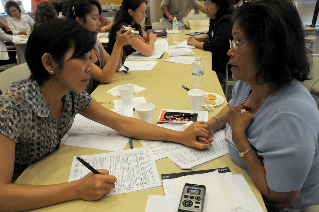 asric_stephane_janin.jpg Professor Leakhena Nou (left) meets with Marie Chea