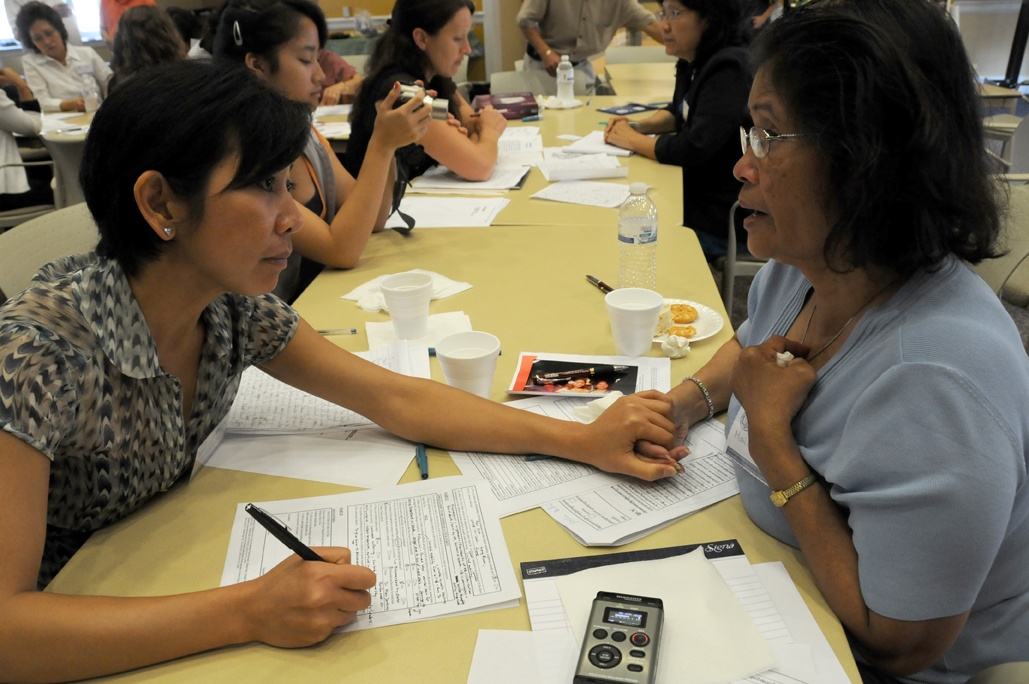 Professor Leakhena Nou (left) meets with Marie Chea