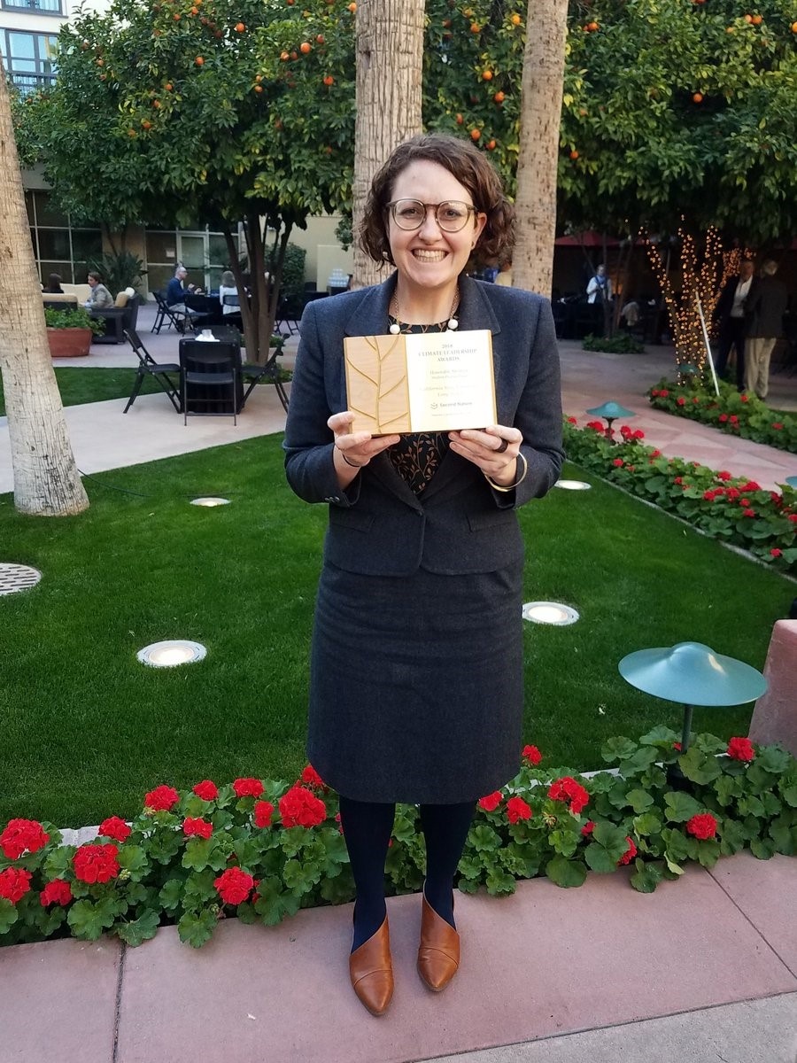award_photo.jpg lily house peters with award plaque