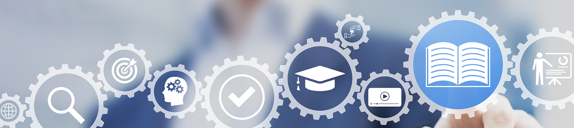 gears with educational symbols overlaid