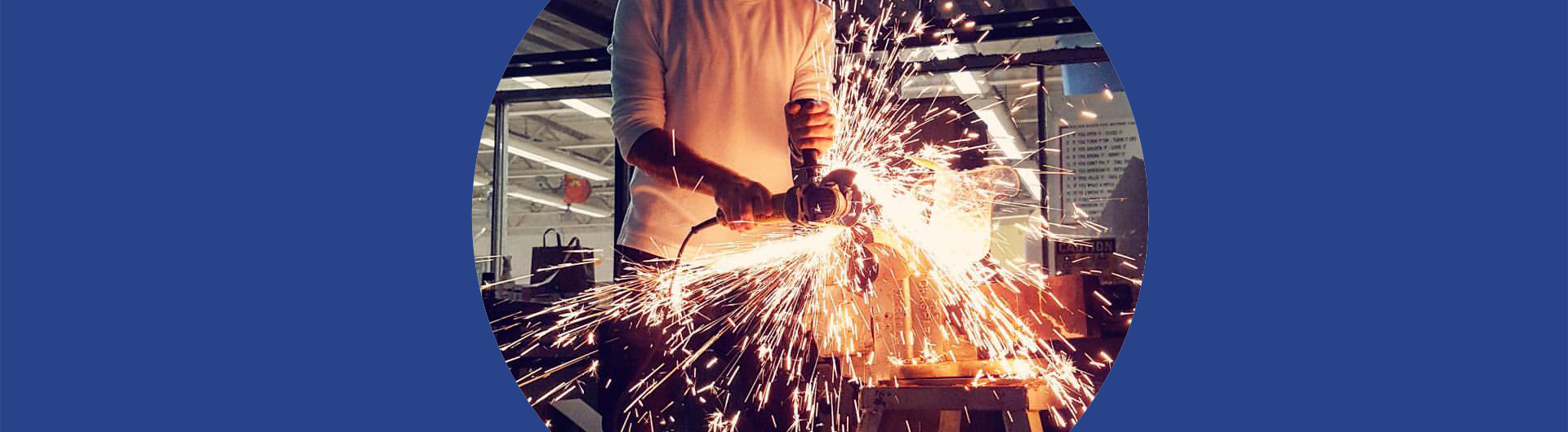 A student works in metal shop