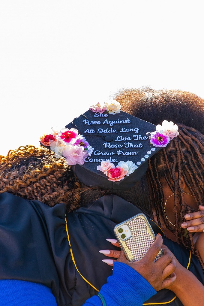 black_and_pan_african_8_rs.jpg A family huge their grad at the 2022 Black and Pan African C