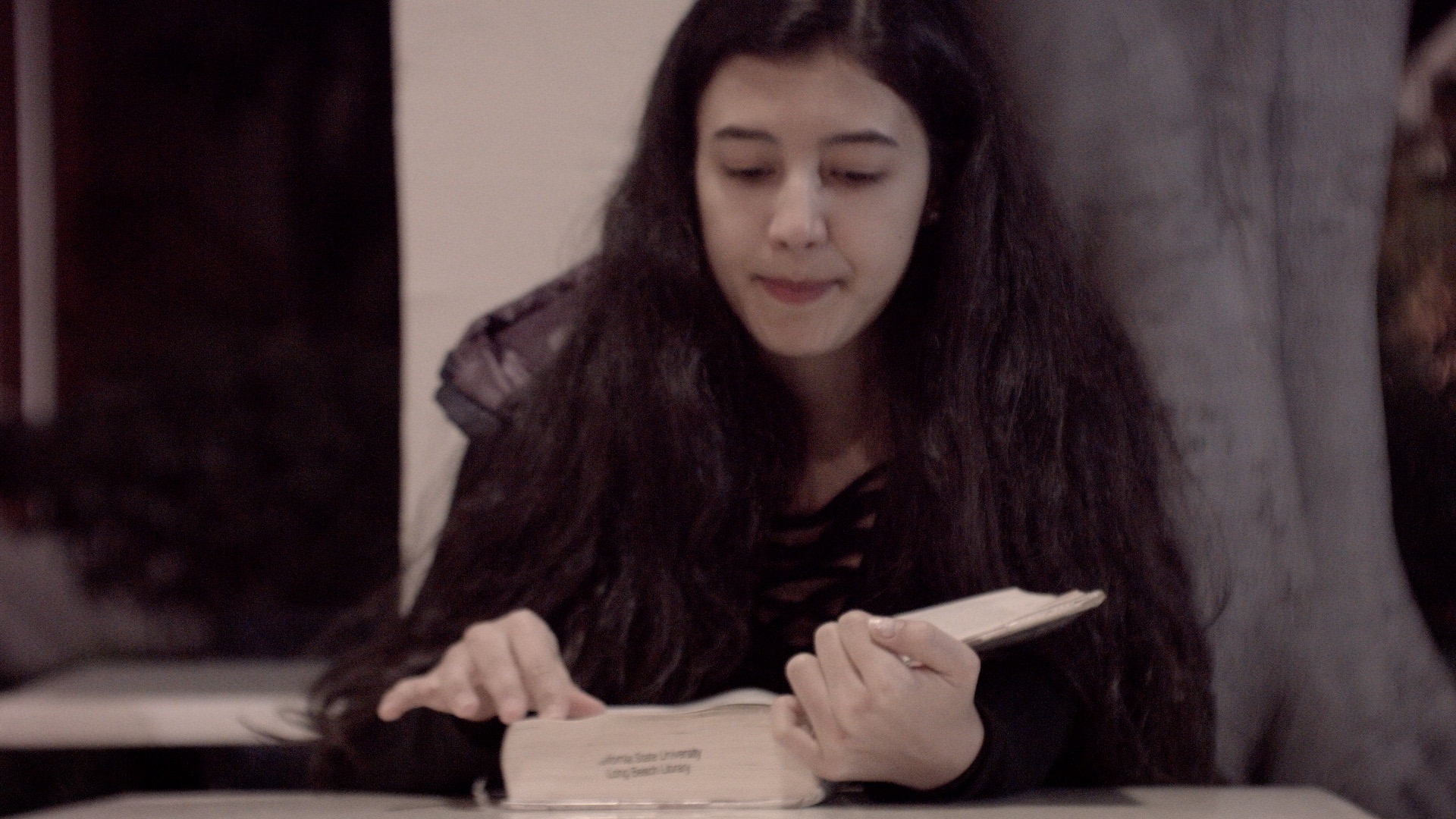 Student reading a book.