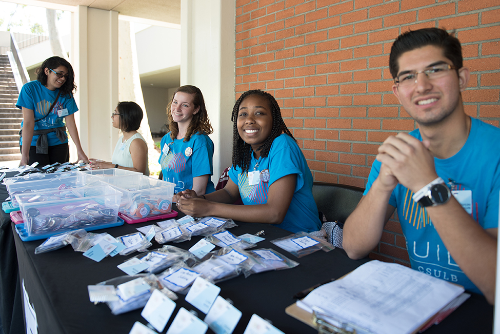 Symposium Registration Desk with Maria Barajas (CLA) BUILD A