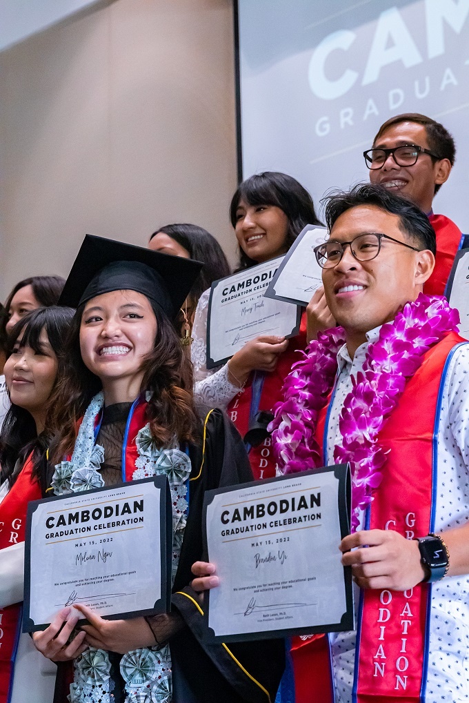 cambodian_5_rs.jpg A family poses with grad at the 2022 Cambodian Cultural Cel