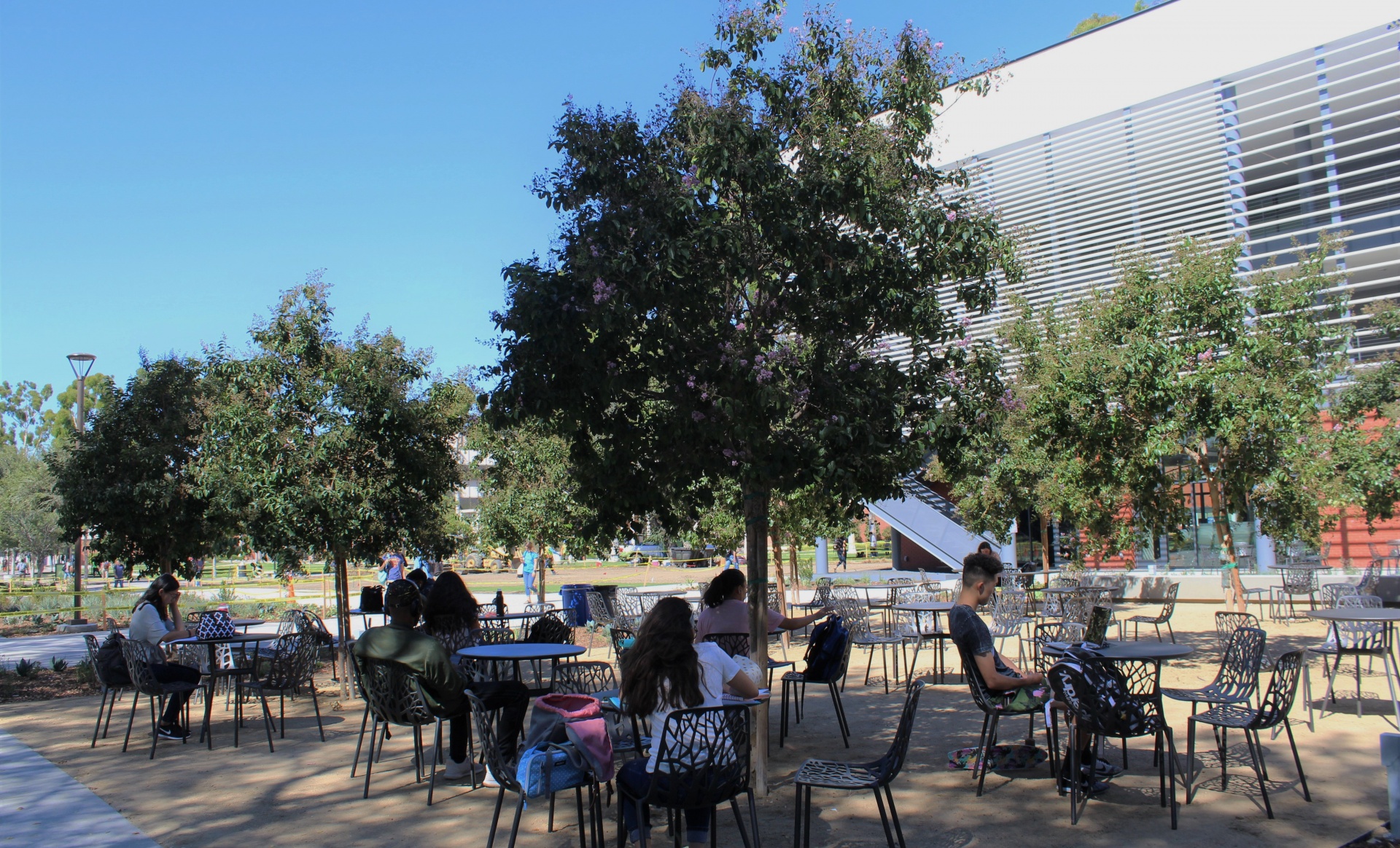 Students sitting in courtyard of CCPE building