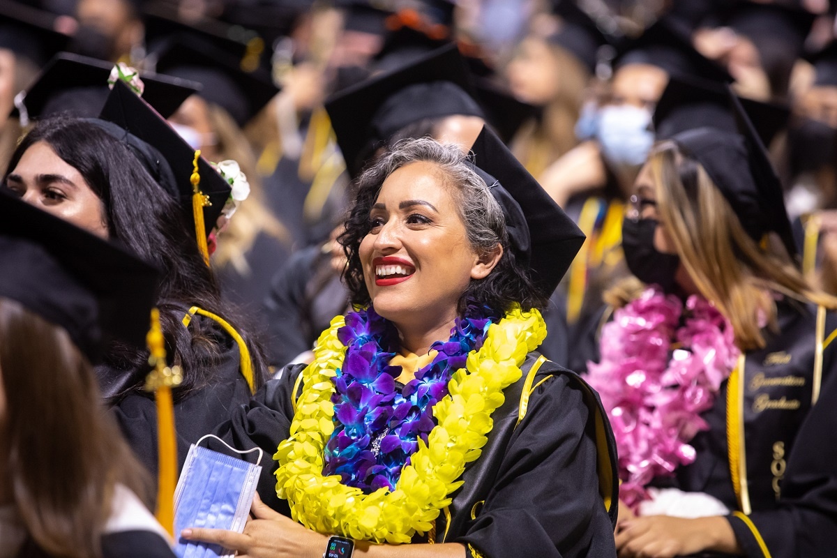 chicano-latino-05_rs.jpg A graduate stands out among the crowd at the 2022 Chicano/La