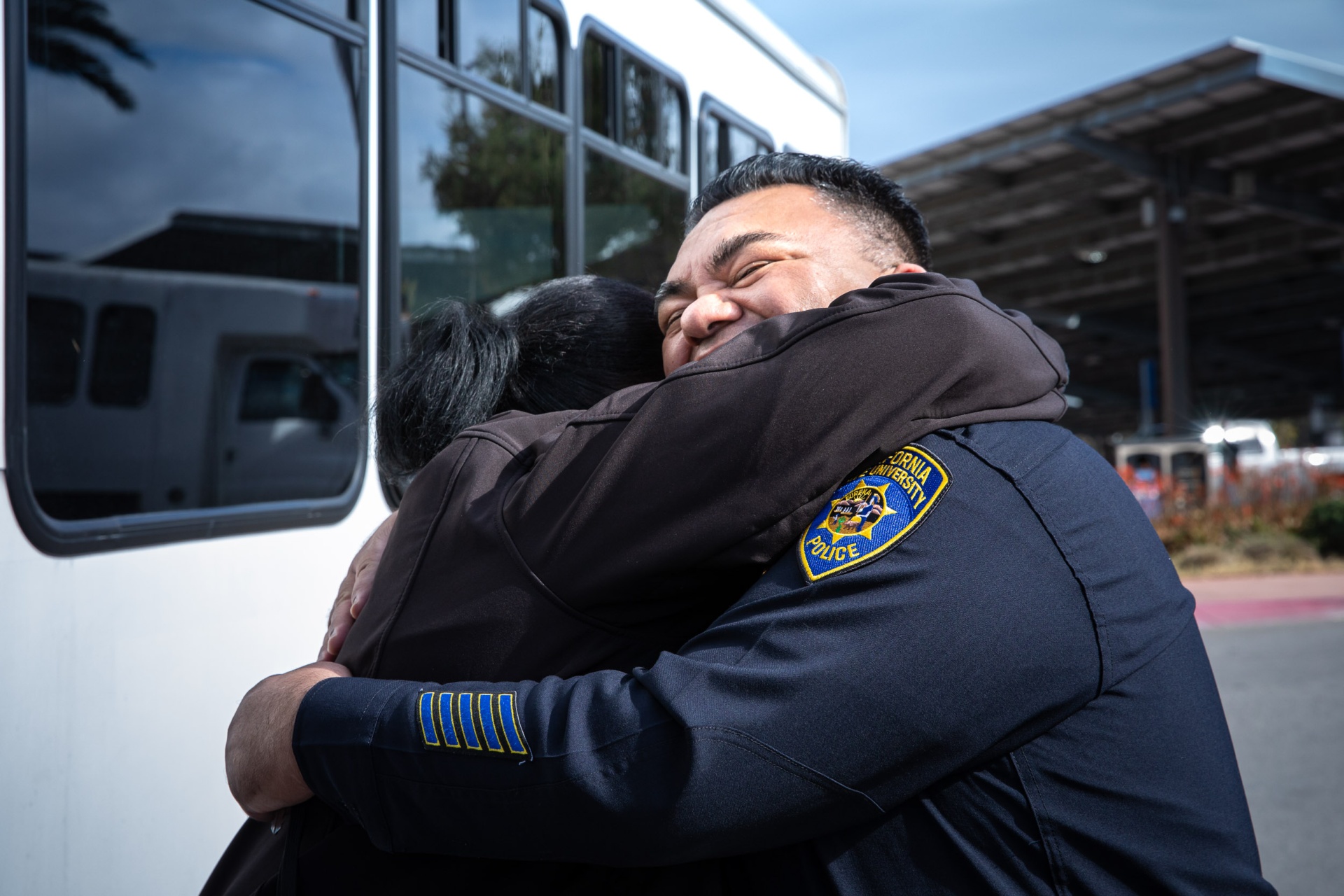 Chief Fernando Soloranzo hugs a student