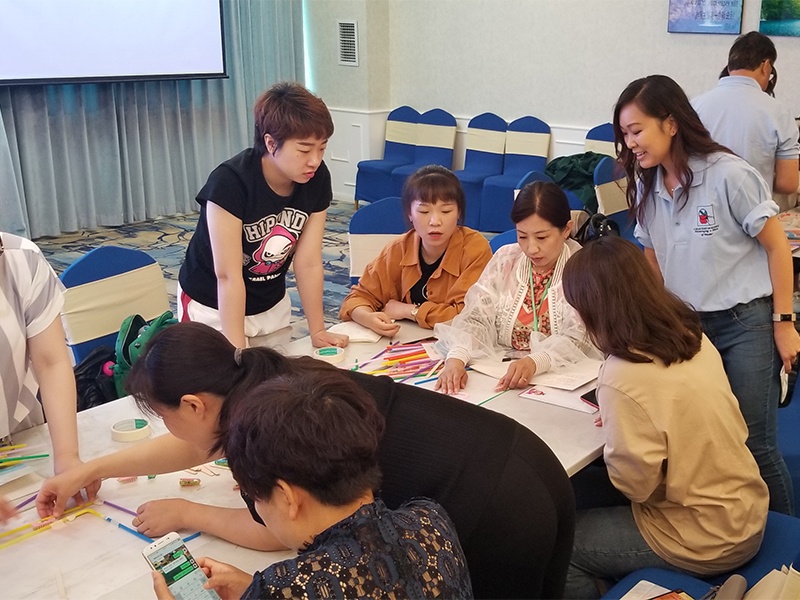 Priscilla conducting a hands-on lesson during the conference