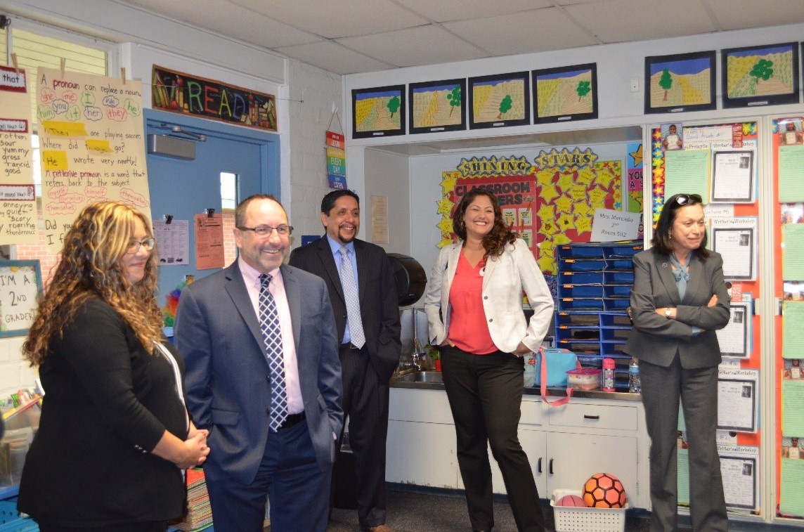 Administrators observing UDCP students in their classrooms a