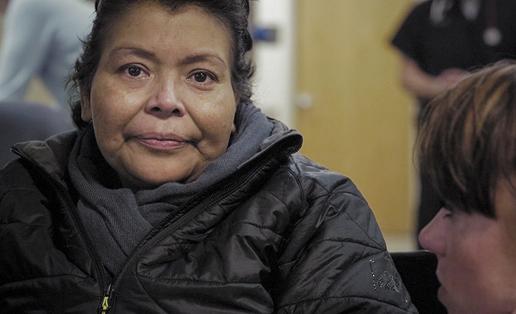 clinica_de_migrantes_06.jpg screen shot - older hispanic woman in the clinic