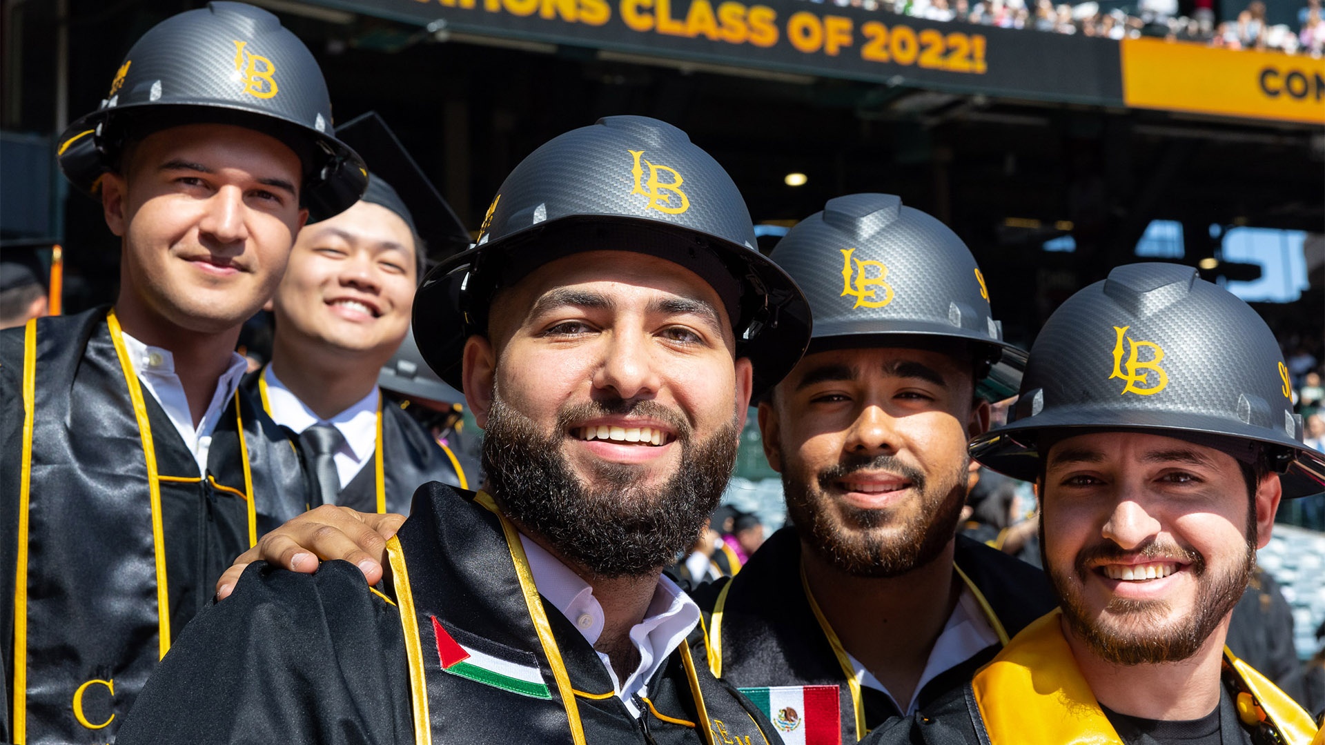 commencement-coe-hero9.jpg Group of male College of Engineering graduates wearing hard