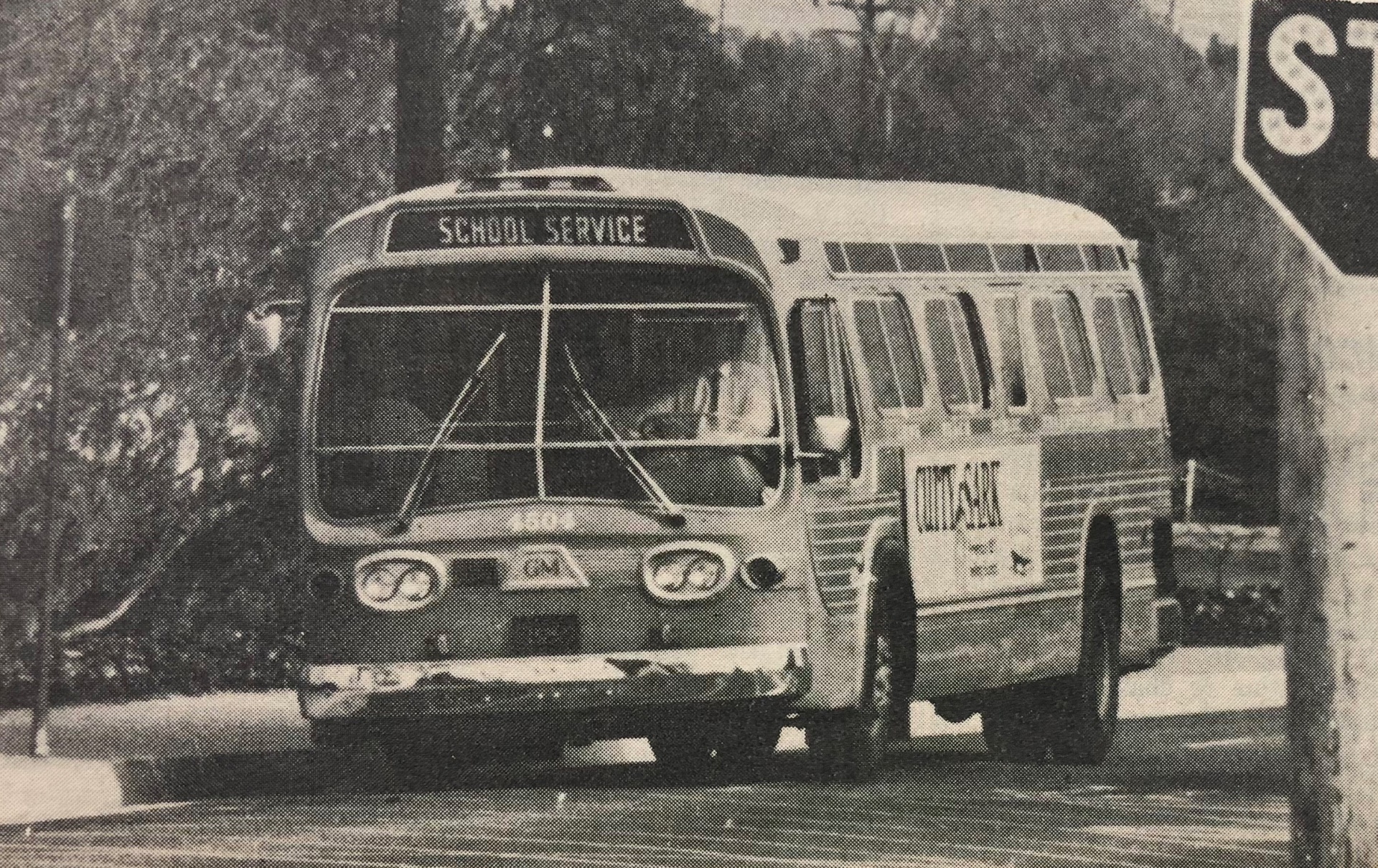 a school bus transports student to campus