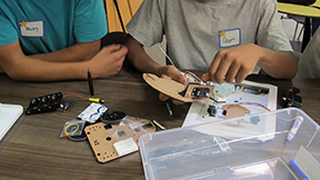 content_ced_asec_robotics_photo.jpg Students working on a project