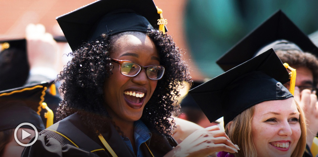 content_honors_commencement-front-play.jpg A woman celebrates at CSULB Commencement