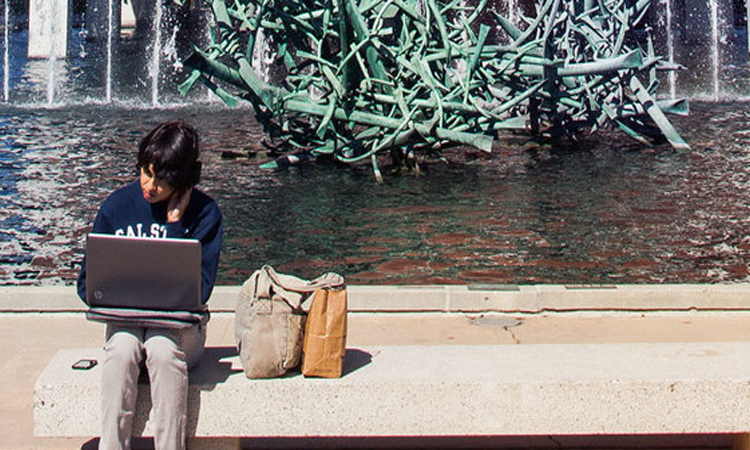 Students near Macintosh Building Fountain