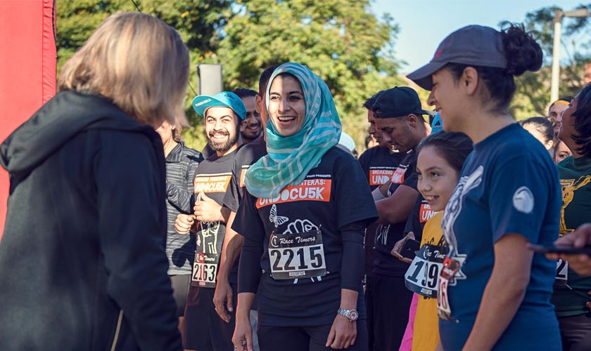 content_markcomm_breakingfronteras1.jpg Students at the race on campus
