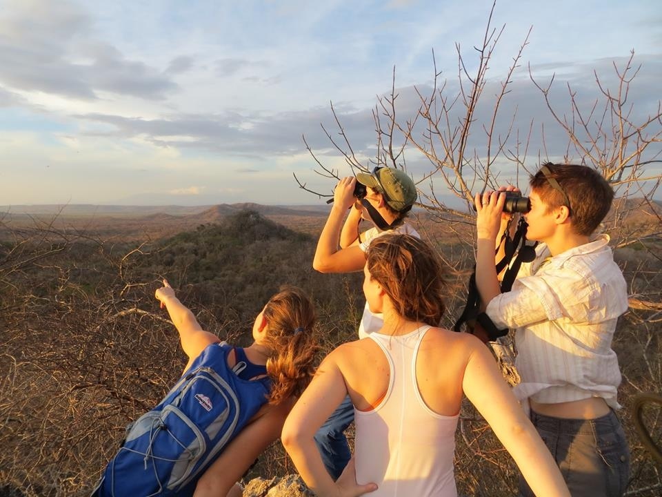 Students watching birds from a mountaintop in Costa Rica