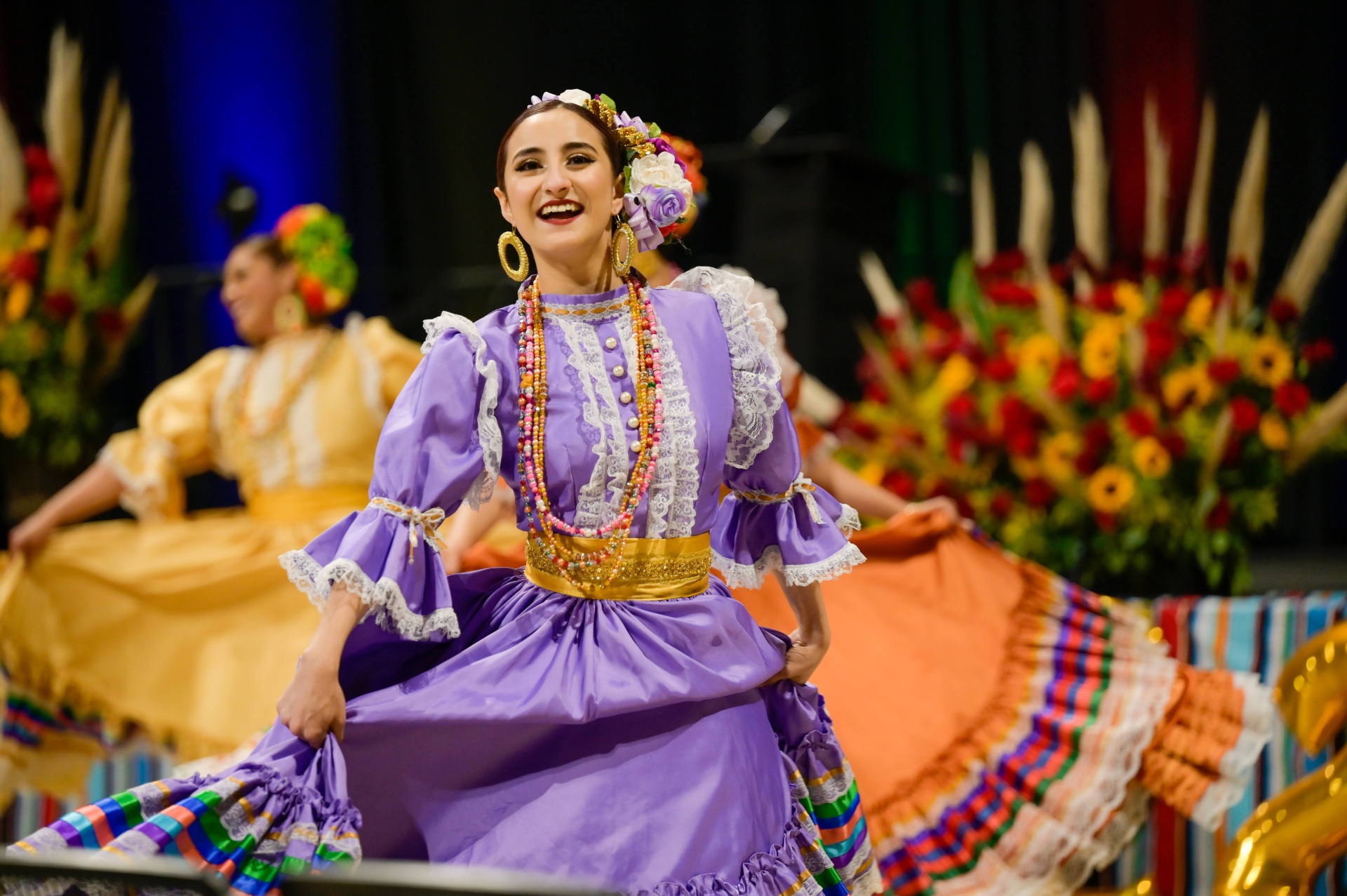 Latino dancer flips her skirt