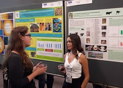 Doreen Cabrera presents her poster on tusk evolution at a co