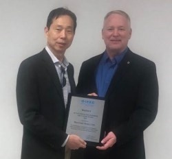 dr._yeh_and_ieee_representative.jpg Dr. Yeh and IEEE representative