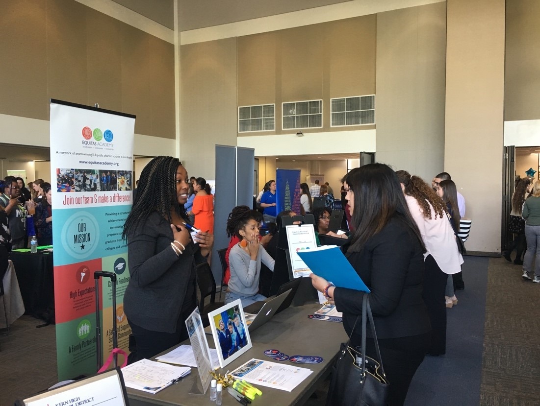 Students and employers meet at the Educators' Job Fair.