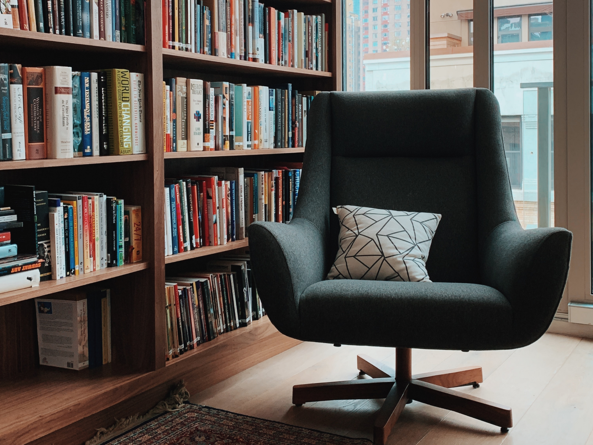 lounge chair with full bookshelf