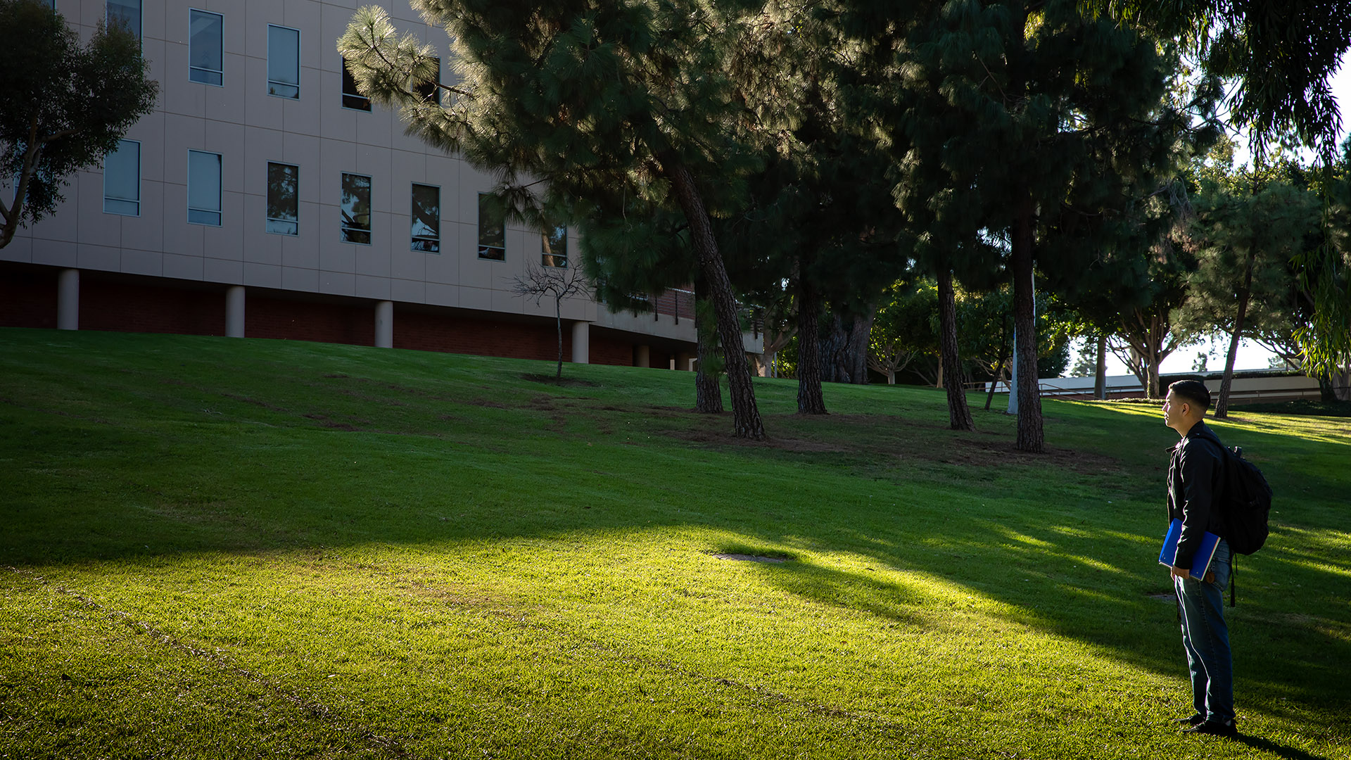 First-gen student Jose Raya Perez looking at USU