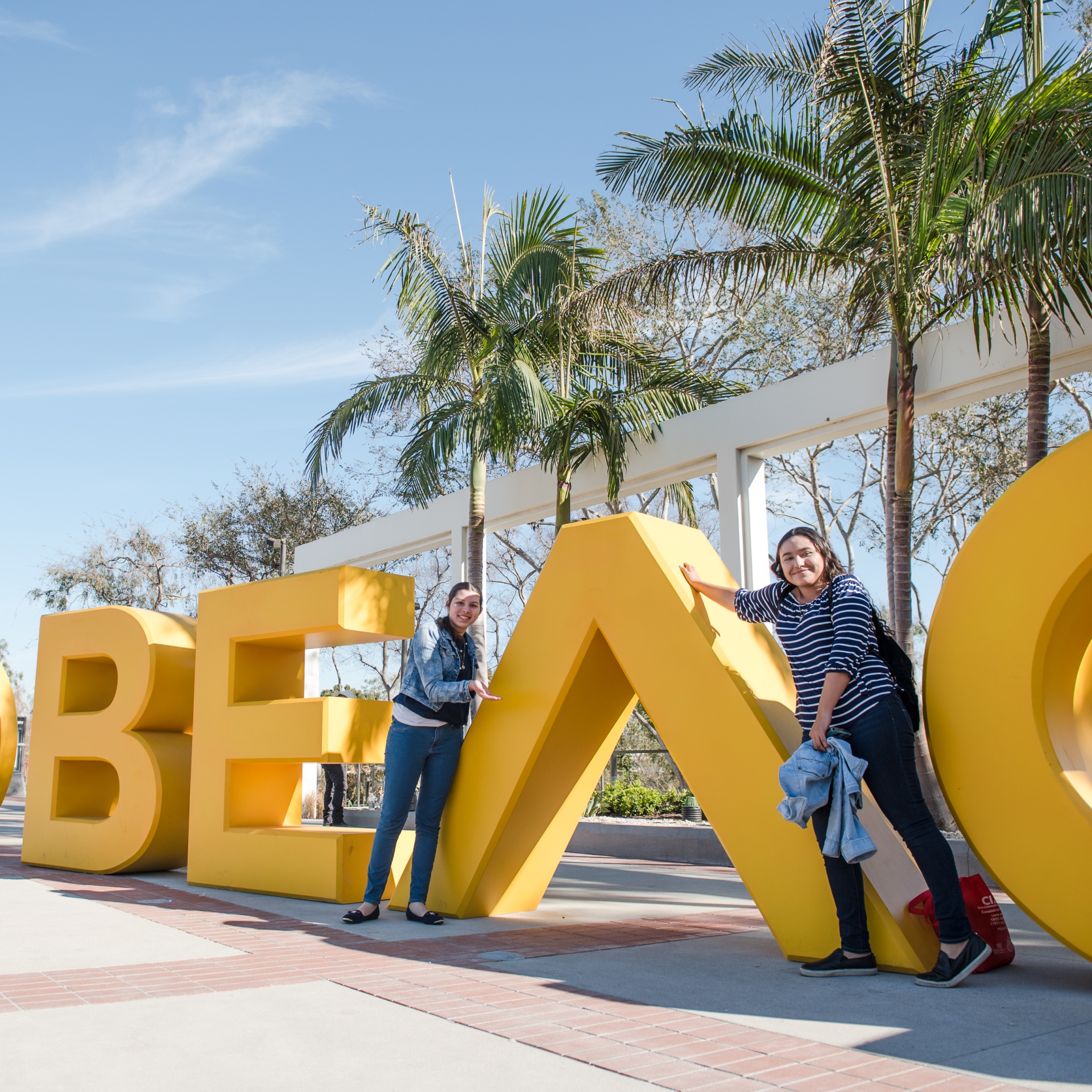 general_campus-09.jpg Beach Academy Students at the Beach Sign