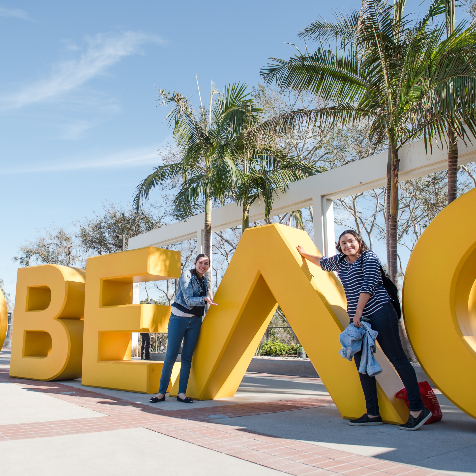 Beach Academy Students at the Beach Sign