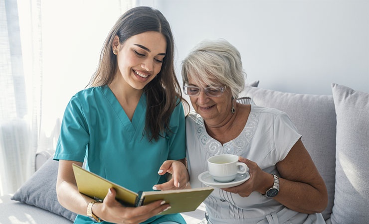 Gerontologist working with elderly patient