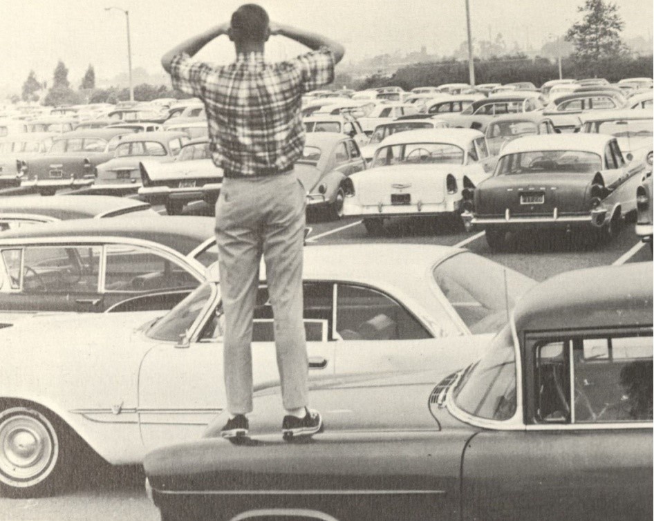 Student looks over the parking landscape