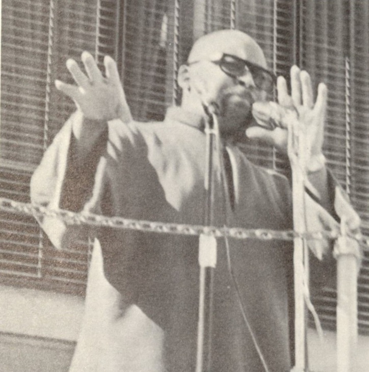 Dr. Karenga speaks in front of a crowd