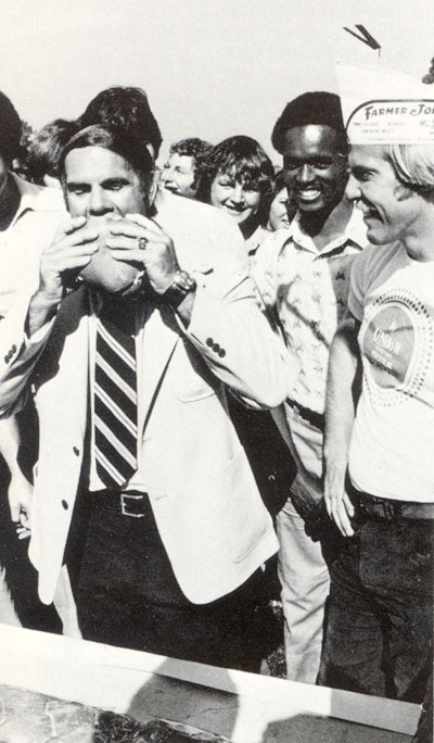 gg_1978_05.jpg a man takes a large bite from the longest submarine sandwich