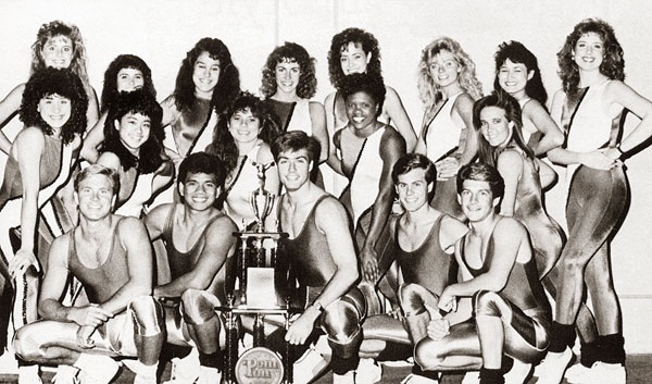 CSULB Cheer squad posing with their trophy